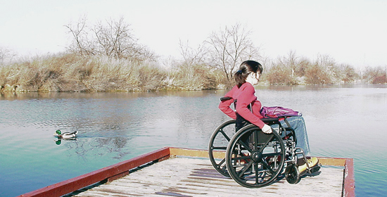 Young girl in wheelchair