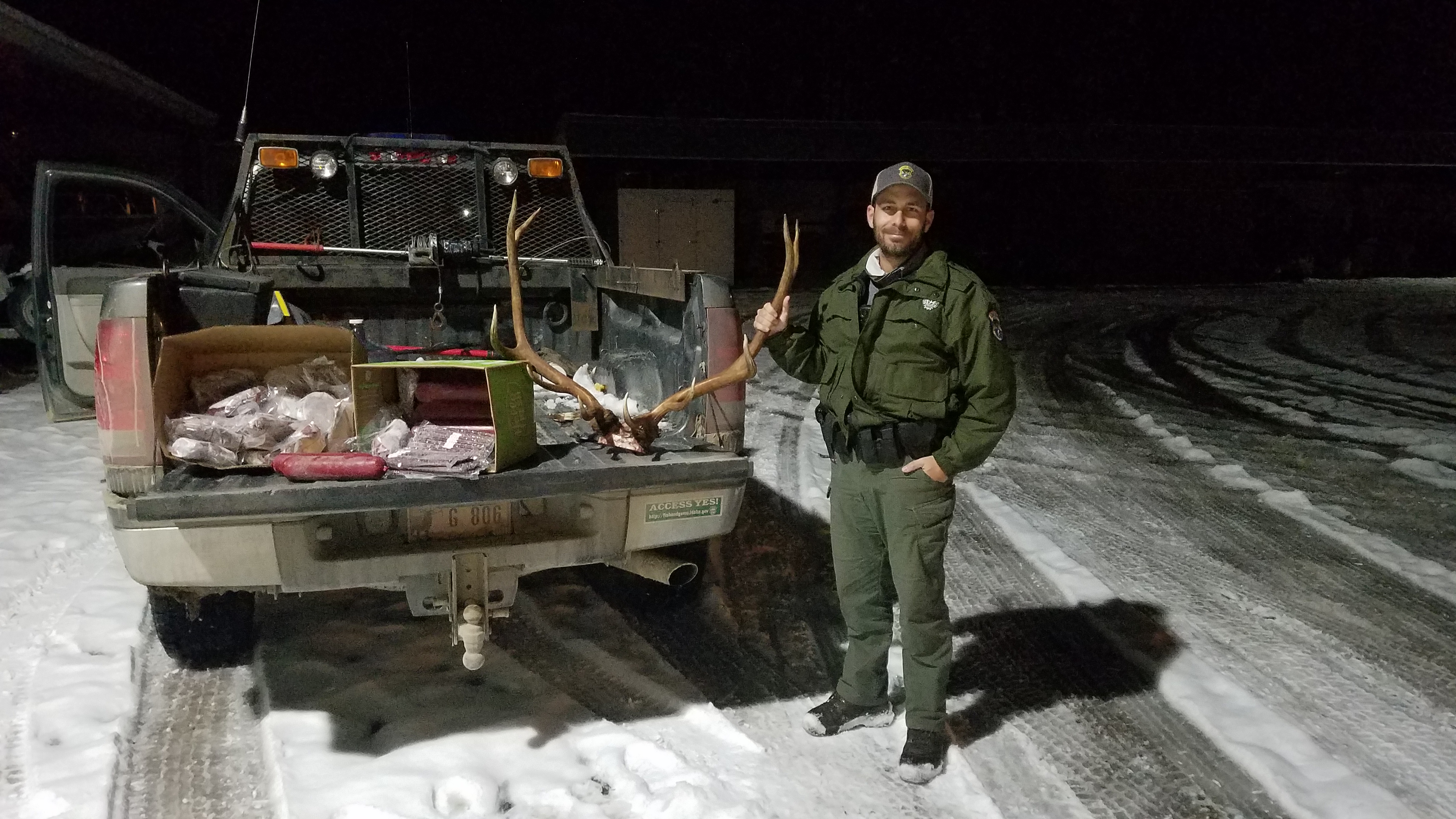 Conservation Officer Jacob Berl with a confiscated elk rack