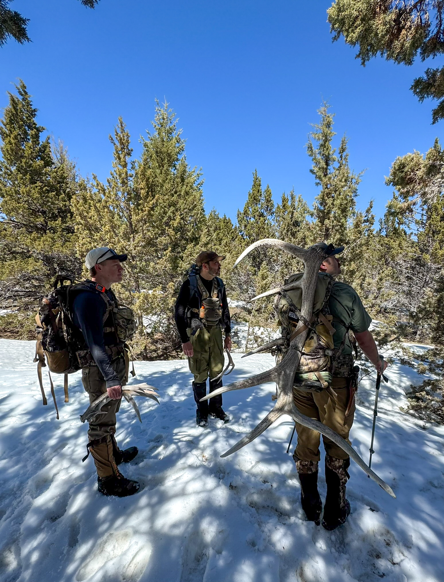 Group of shed hunters standing in the snow in the Owyhees