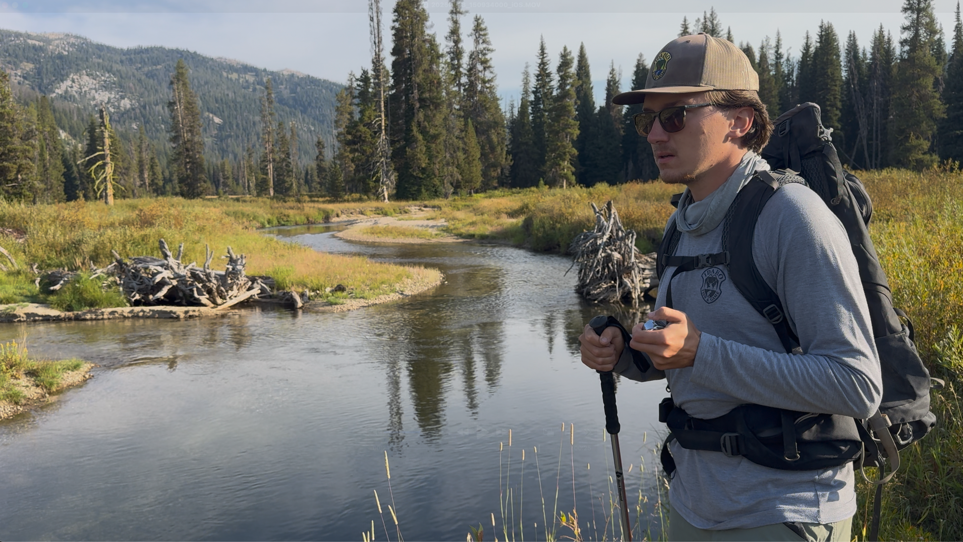 Fisheries technician Caleb Wilson counts spawning kokanee on the Deadwood river during a 2025 survey.