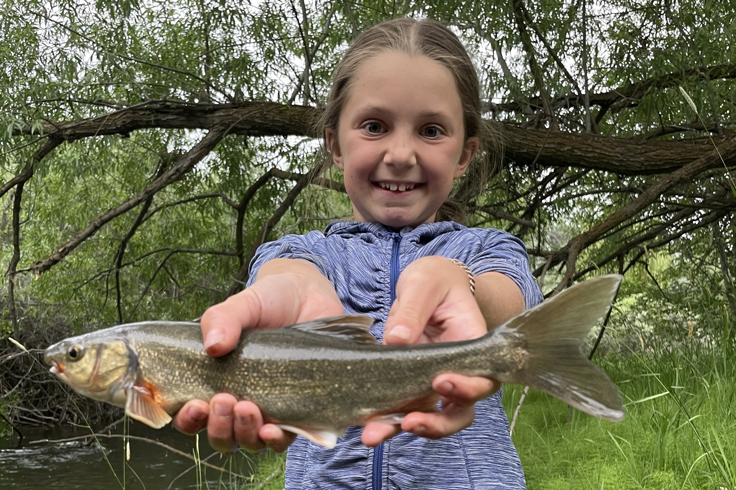 Angler Akeley Fahnholz with her new state record chiselmouth
