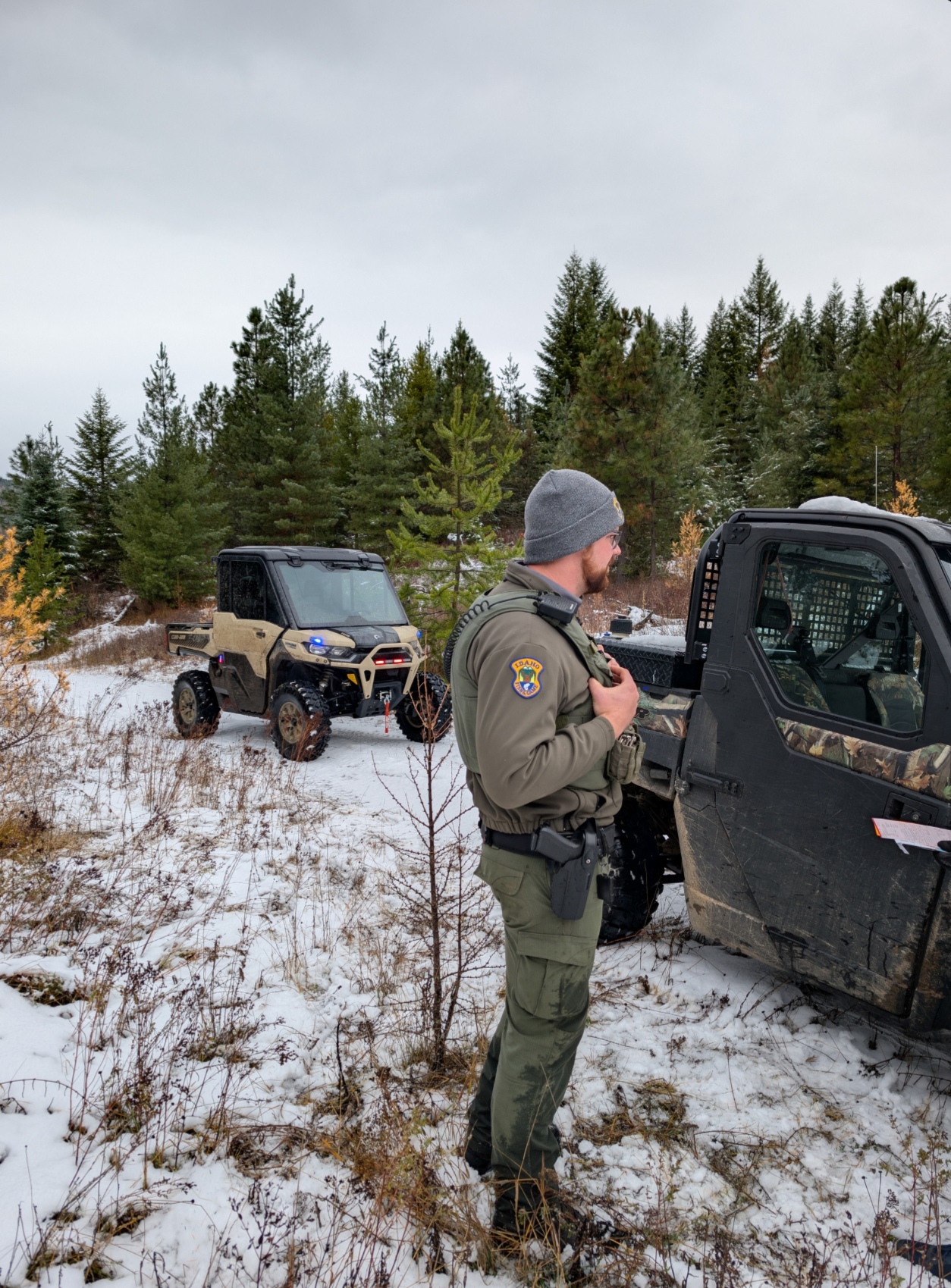 Idaho Fish and Game conservation officers making public contact on privately owned timber land in North Idaho.