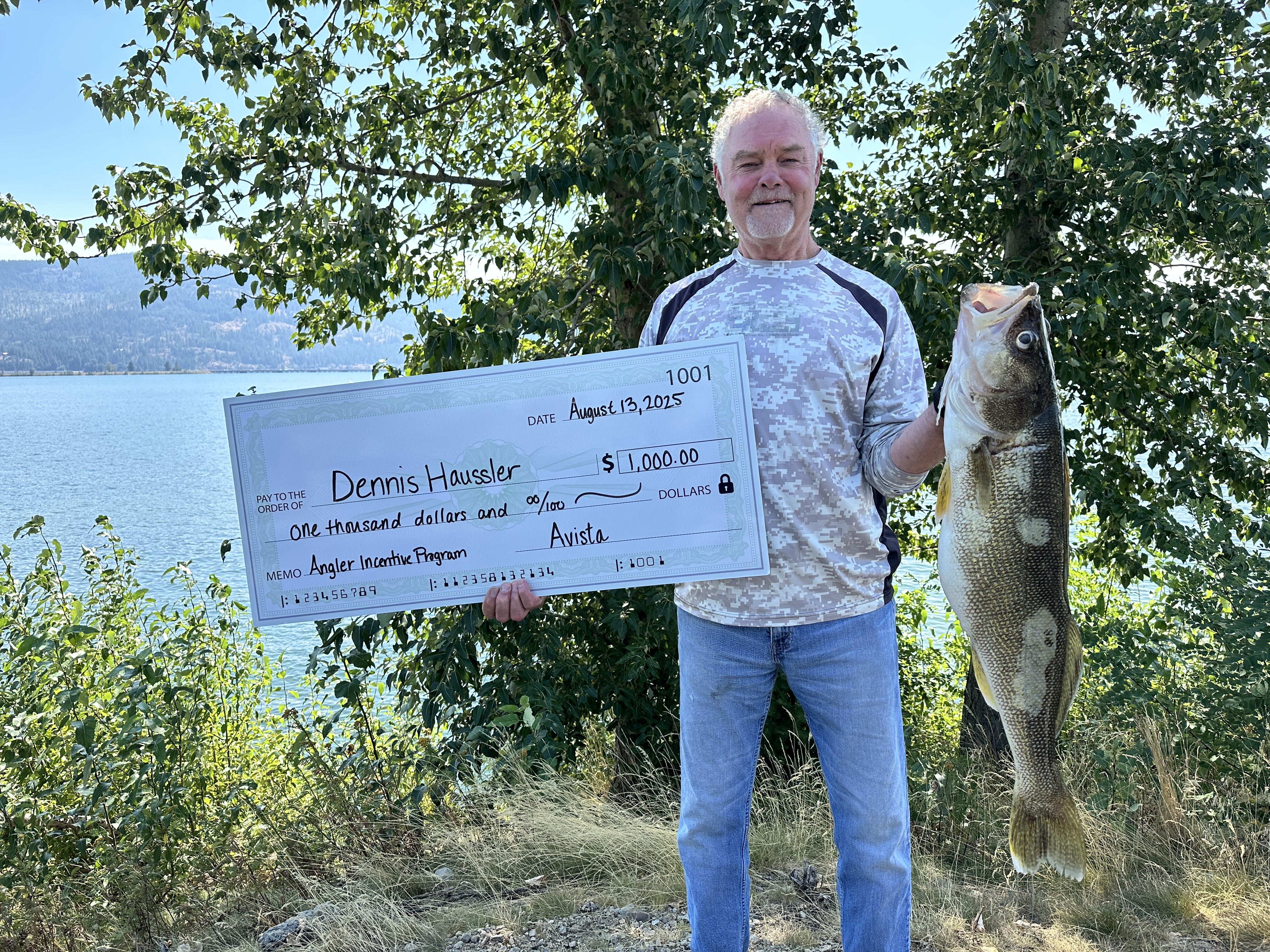 Lake Pend Oreille spearfisherman with a winning walleye