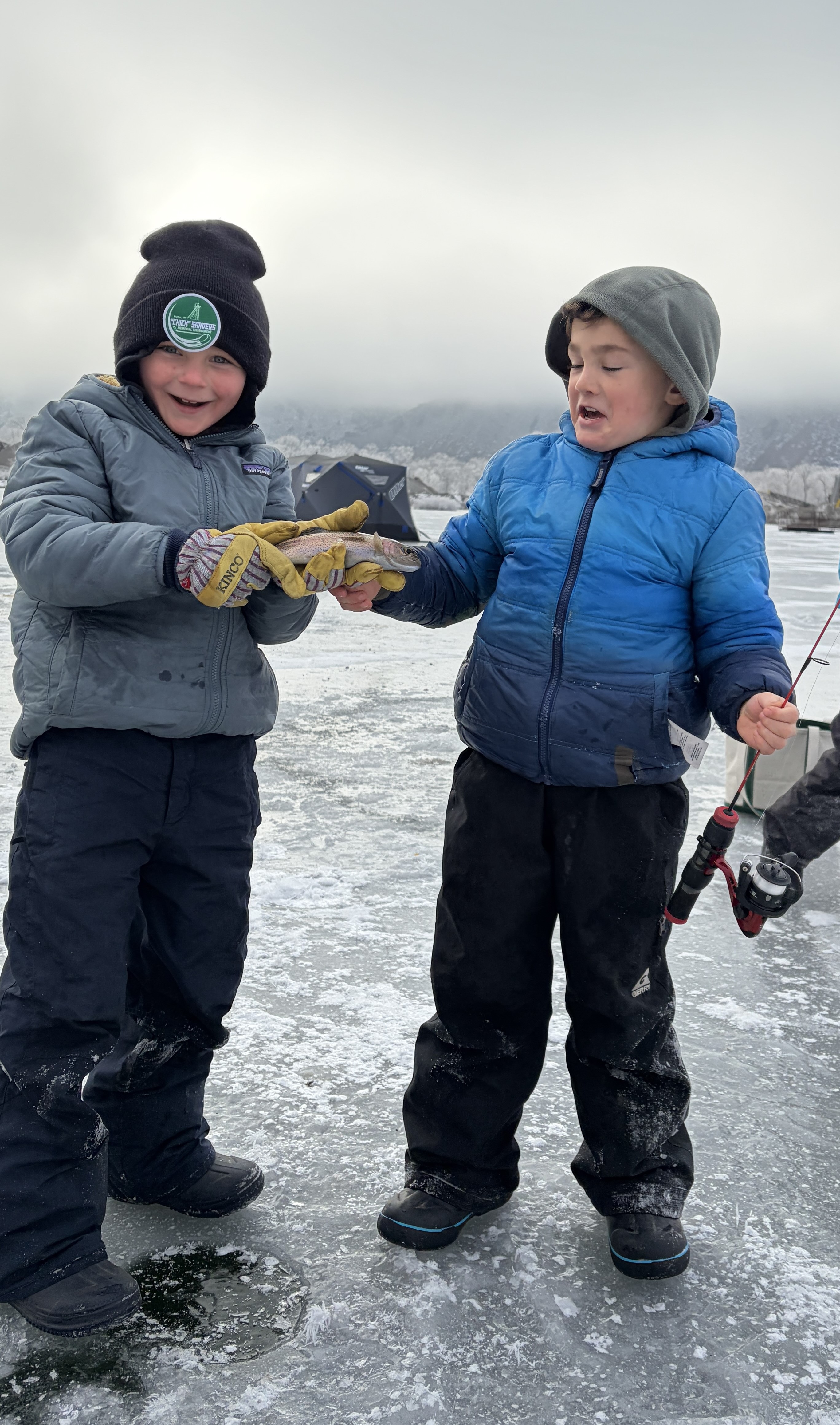 Two local anglers enjoying ice fishing on Johnson Pond