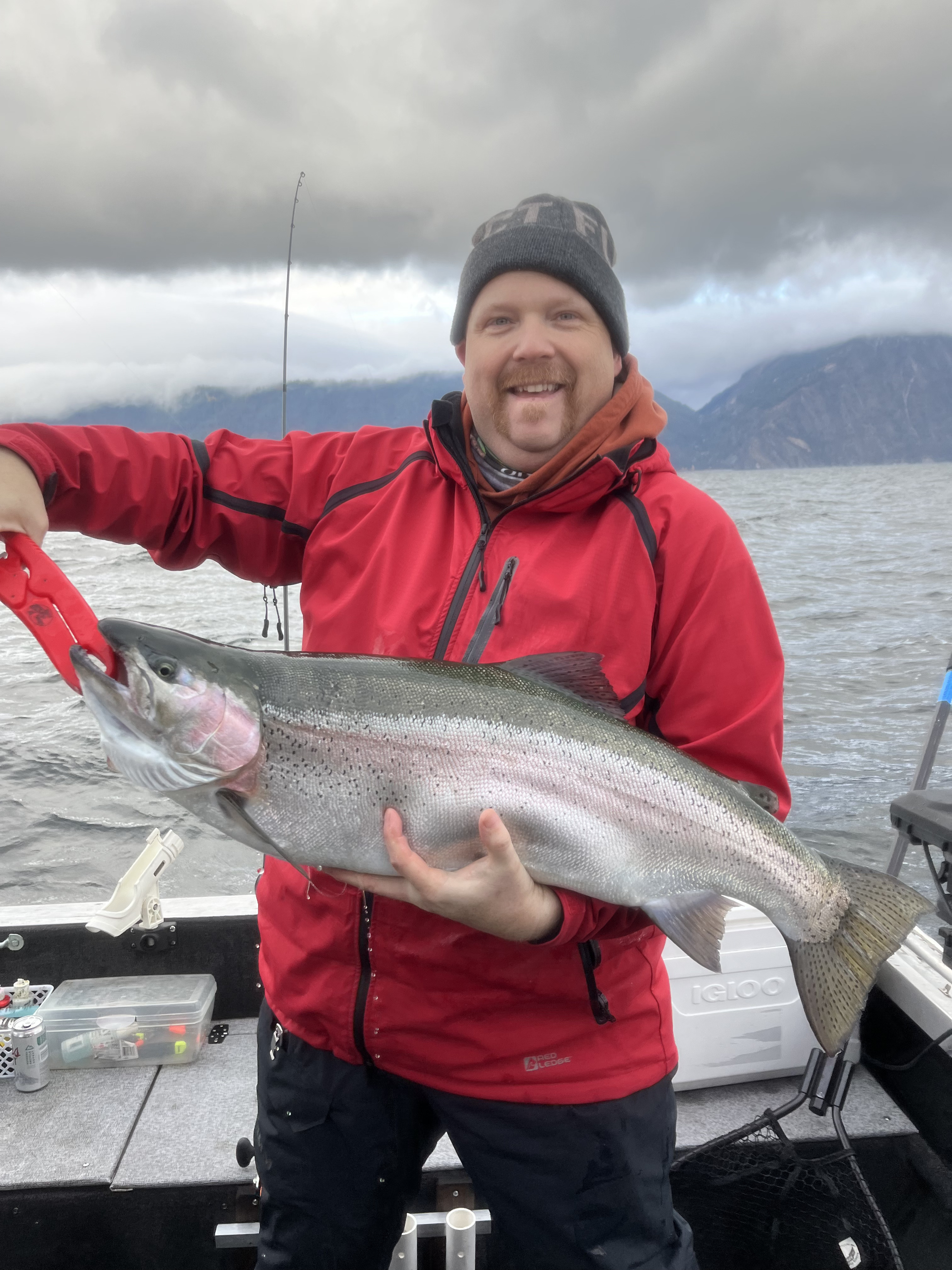 Angler on Lake Pend Oreille with rainbow trout