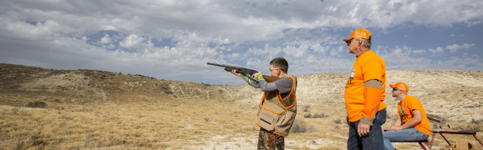 Young hunters practice shooting clays before hunting pheasants at the C.J. Strike WMA