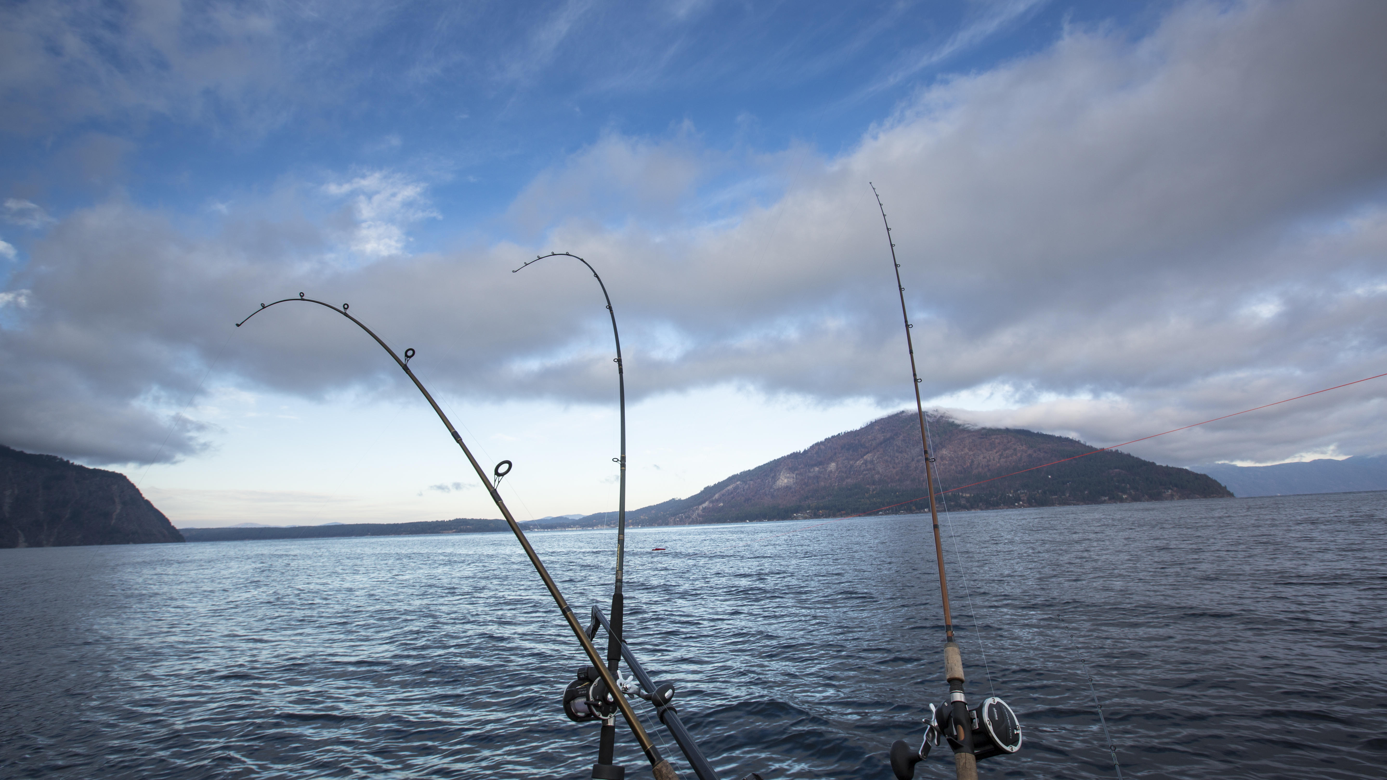 wide shot of Lake Pend Oreille with fishing poles in the foreground October 2010