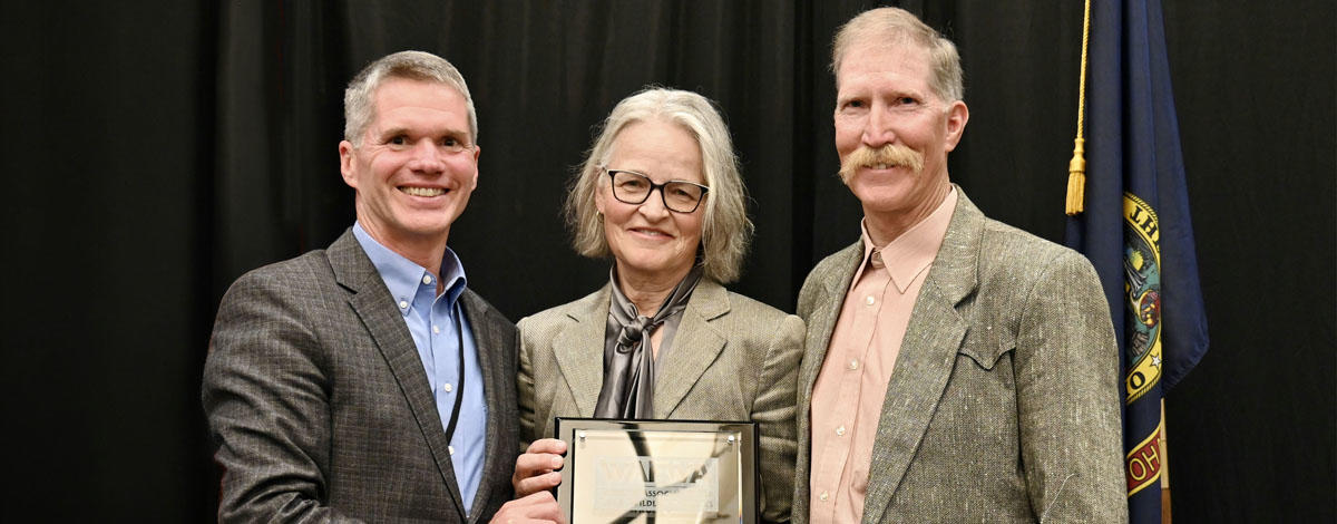 Mark and Wendy Pratt of Blackfoot receive award from Director Jim Fredericks