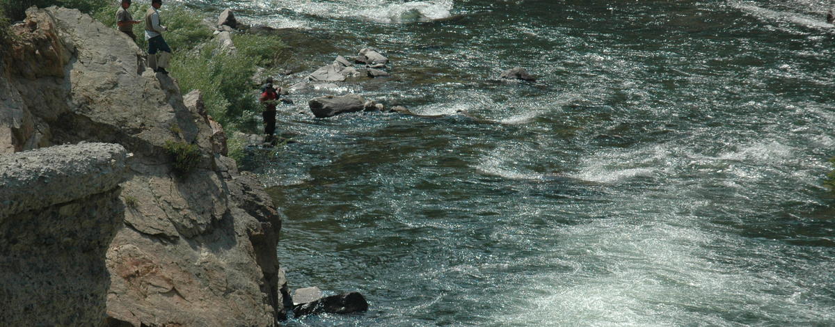 wide shot of anglers fishing for chinook near the old Sunbeam Dam on the Yankee Fork of the Salmon River July 18, 2008