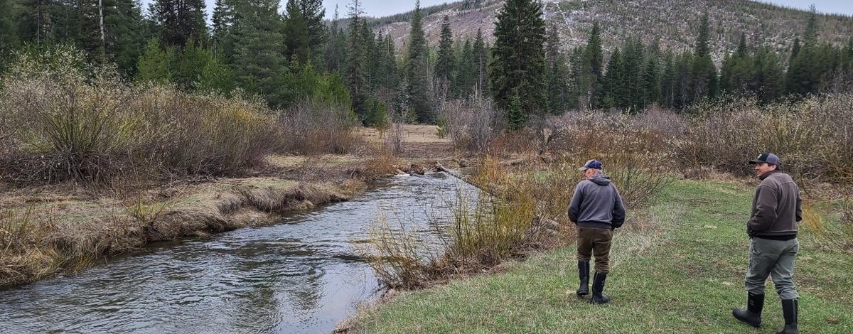 Walking a restoration site with landowner