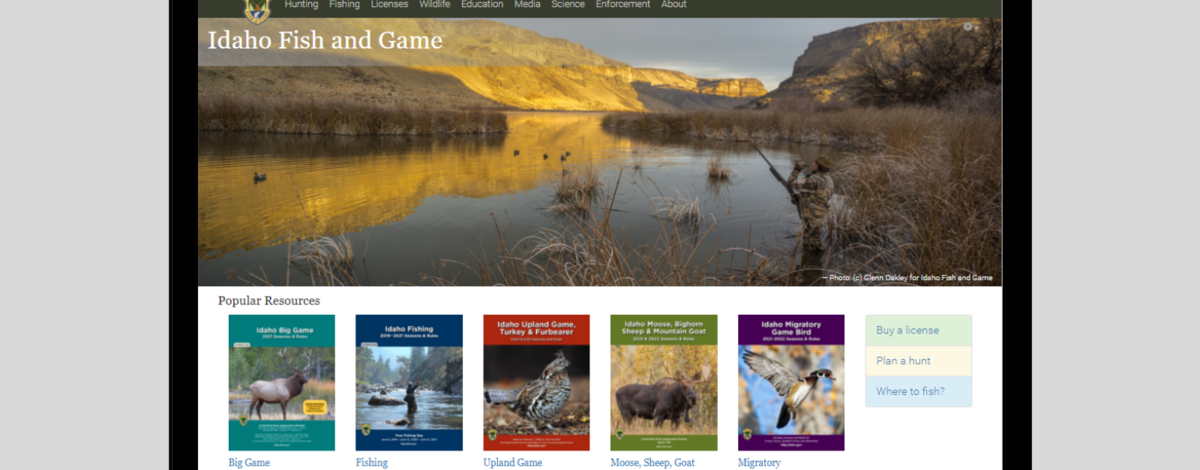 A laptop with the Idaho Fish and Game homepage on the screen
