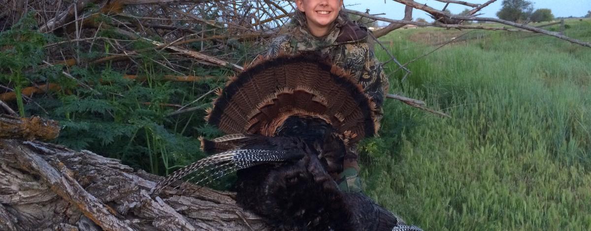 boy with his turkey 