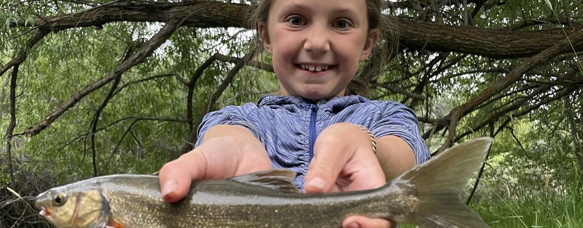 Angler Akeley Fahnholz with her new state record chiselmouth