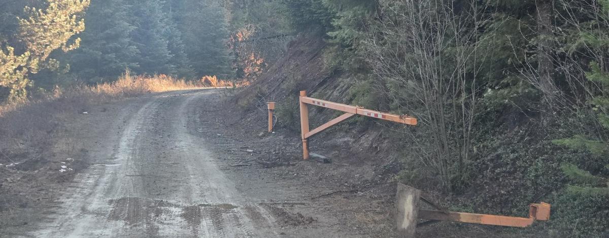 Destroyed gate on privately owned corporate timber land in North Idaho.