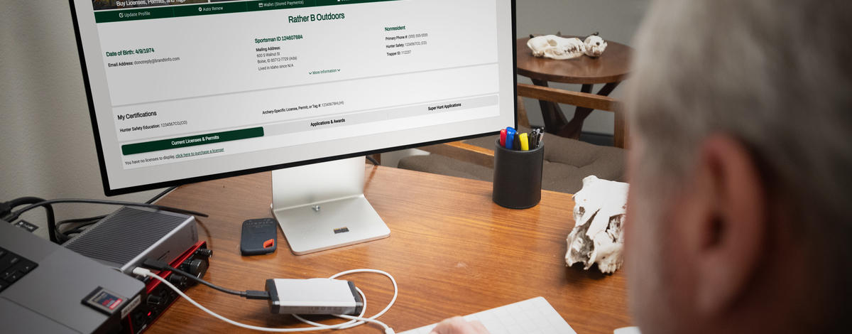 IDFG white male typing on computer tag sale 