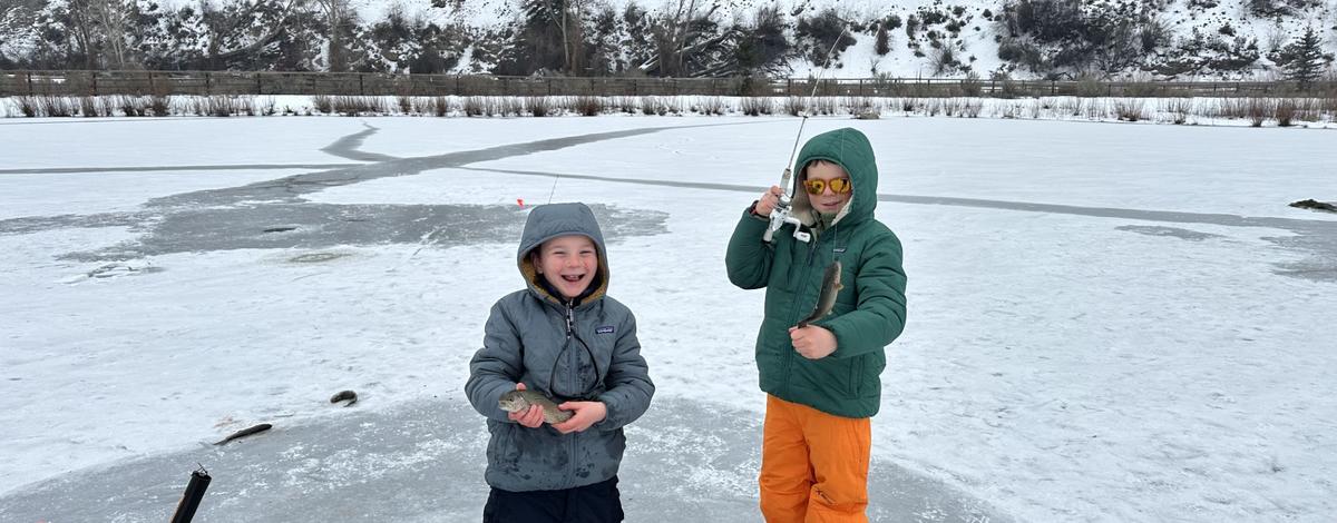 Two local anglers enjoying ice fishing on Johnson Pond
