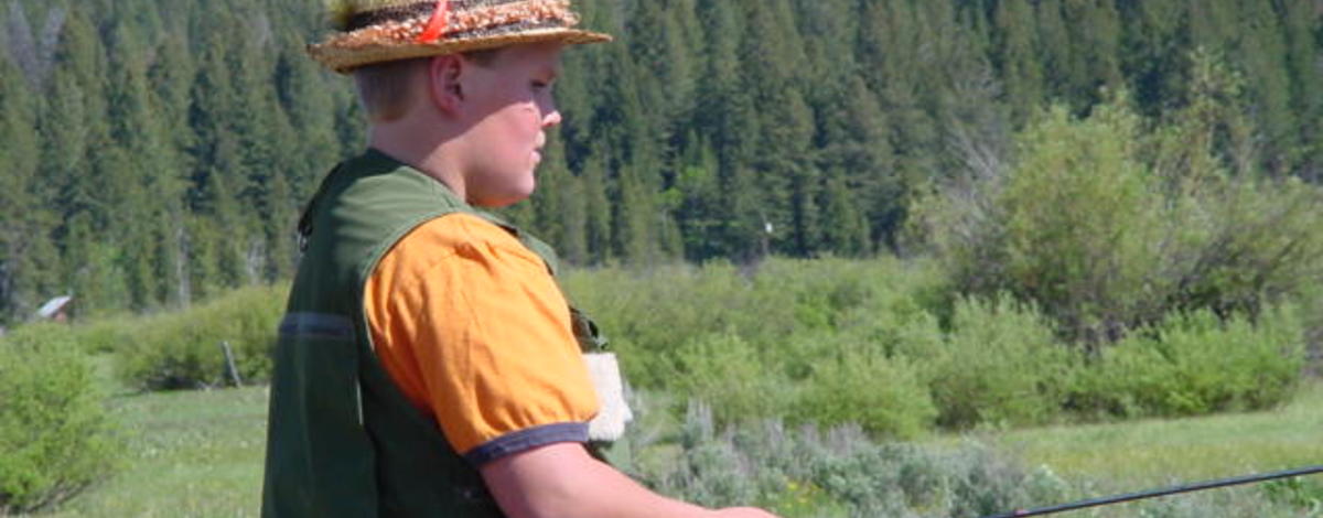 boy fishing on free fishing day June 2003