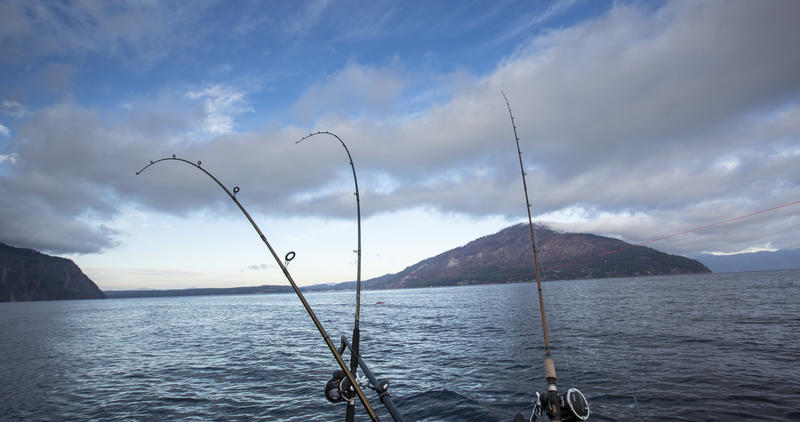 wide shot of Lake Pend Oreille with fishing poles in the foreground October 2010