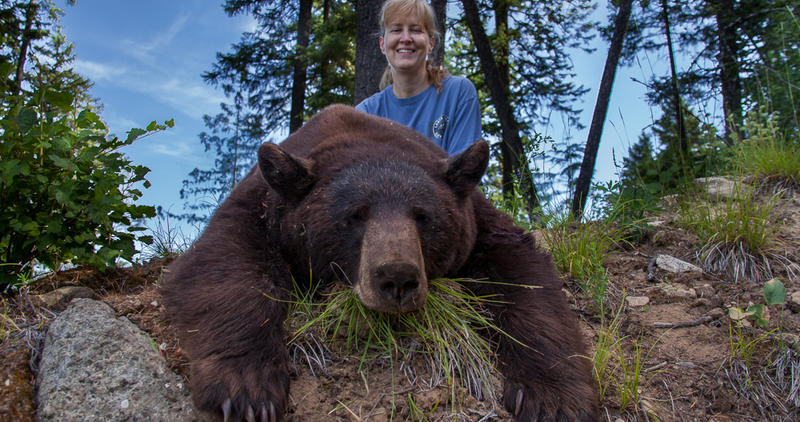 woman with her brown bear June 2015