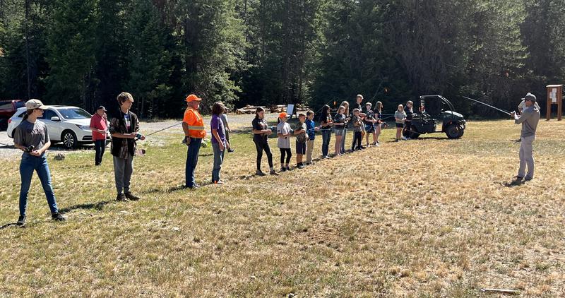 Students practicing casting at Learn to Hunt and Fish Day Camp in the Panhandle Region