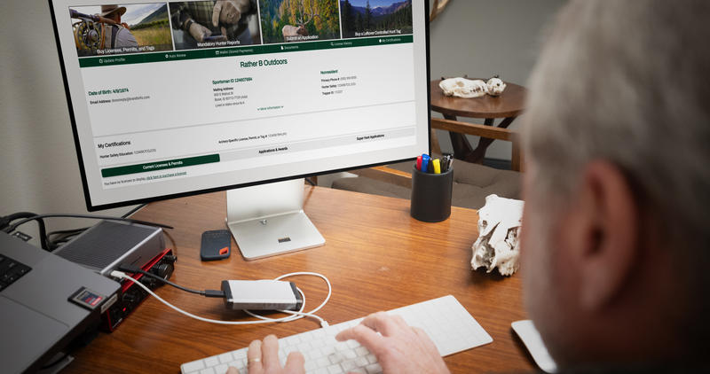 IDFG white male typing on computer tag sale 