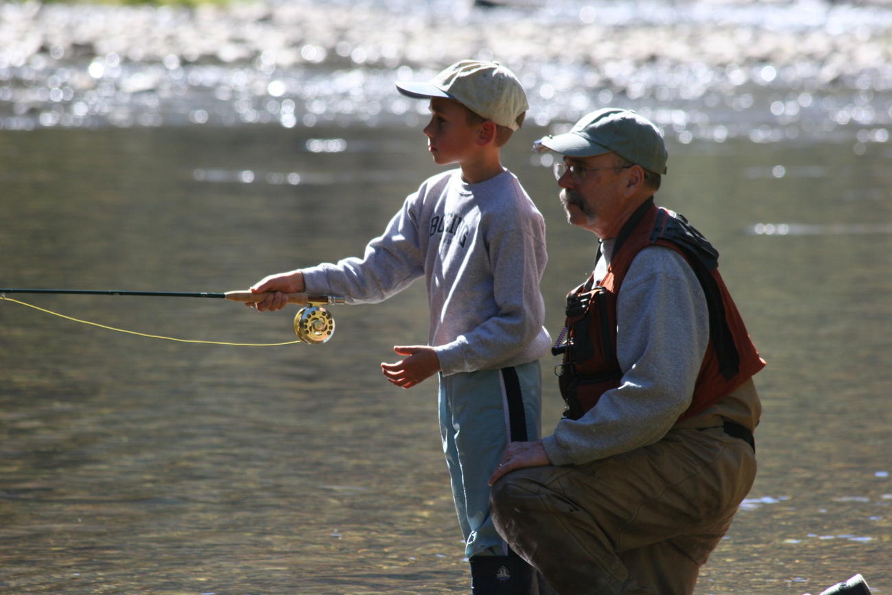 father and son fly fishing on the Clearwater River September 2007