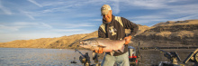 Releasing a wild Fall Chinook salmon