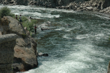 wide shot of anglers fishing for chinook near the old Sunbeam Dam on the Yankee Fork of the Salmon River July 18, 2008