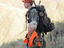 dad and Alex hunt dressed in hunter orange after taking hunter education October 2010