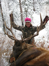 woman with her bull elk 