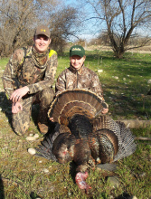 father and son with their turkey April 2014