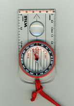 A liquid-filled protractor or orienteering compass with lanyard, public domain by Adrian Pingstone