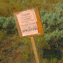 Grizzly bear trapping warning sign