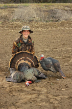 boy with his turkey and decoy vertical shot April 2015