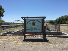 Hayspur fish hatchery informational sign and fish runs medium shot June 2015