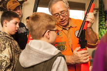 Gary Gillespie instructs students on hunter responsibility and how to use a rifle during a Hunter Education class January 2014