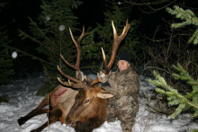 hunter with large trophy bull elk 2010