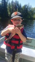 Kid with trout