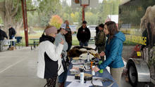 Idaho Fish and Game staff interacting with members of the public.