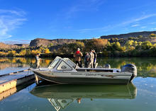 Fish and Game staff plan their day before conducting a fish mortality survey on the Snake River.