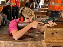 Students shooting with RSOs at Learn to Hunt and Fish Day Camp in the Panhandle Region
