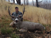 hunter with his mule deer buck October 2015
