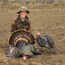 boy with his turkey and decoy vertical shot April 2015