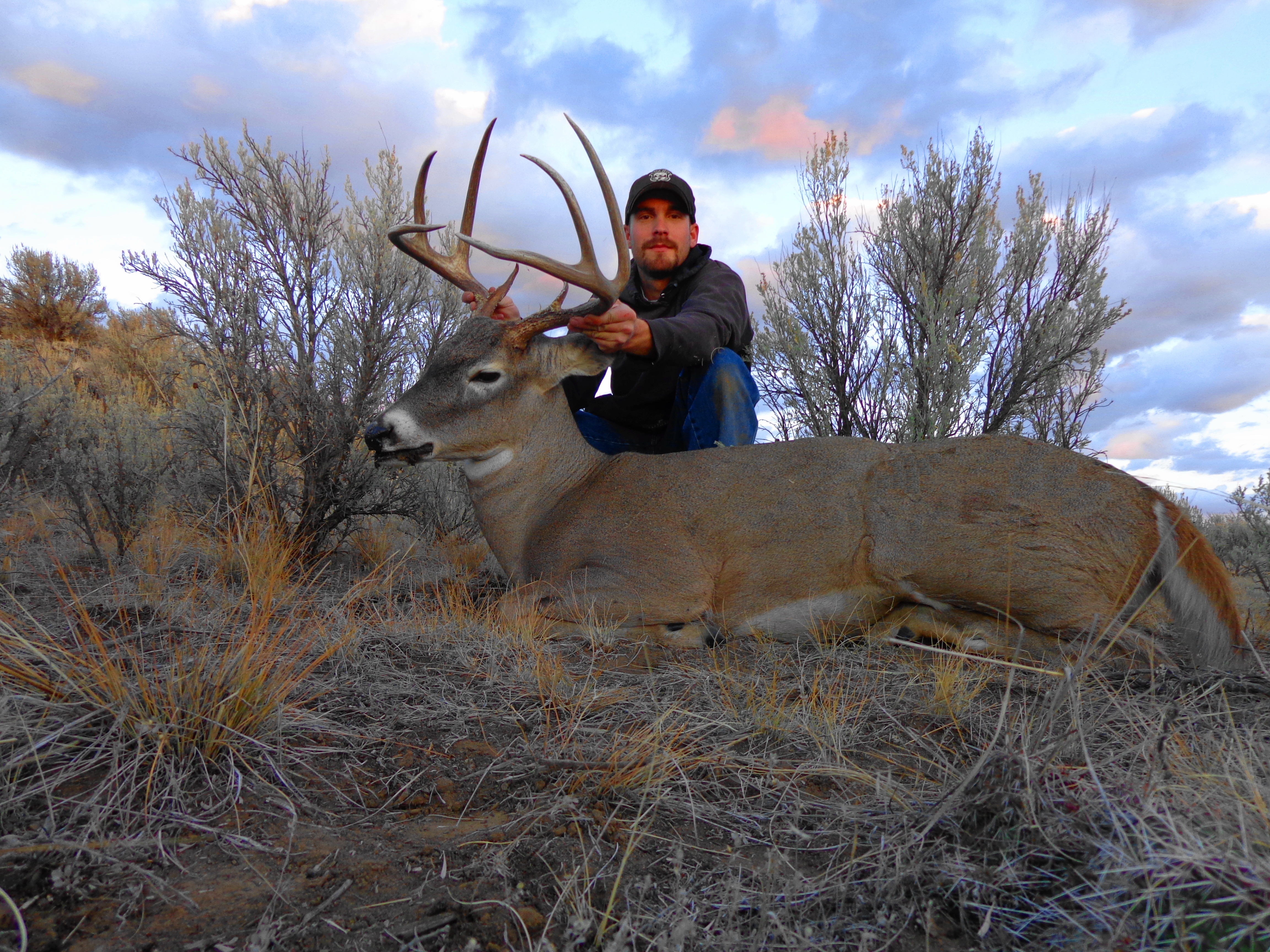 hunter with his whitetail buck October 2012